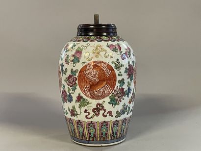 A Chinese porcelain lamp base decorated with...