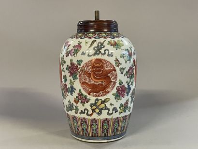 A Chinese porcelain lamp base decorated with...