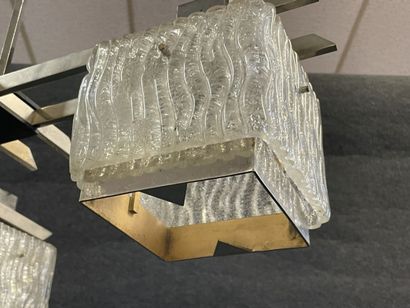 Chromed metal chandelier and four textured...