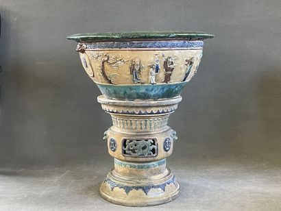 Large ceramic basin of round form, resting...