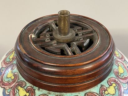 A Chinese porcelain lamp base decorated with...