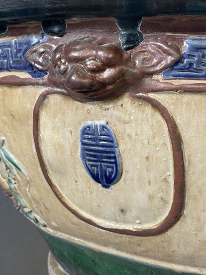 Large ceramic basin of round form, resting...