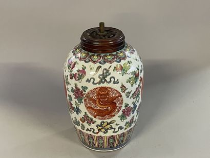 A Chinese porcelain lamp base decorated with...