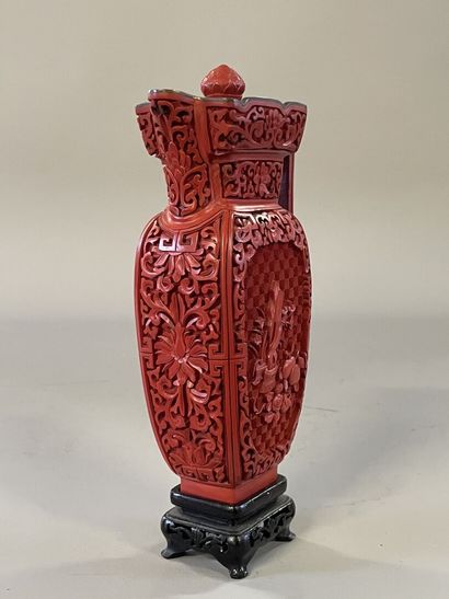 Carved lacquer jug on a wooden base. 
H....
