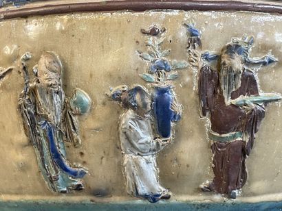 Large ceramic basin of round form, resting...