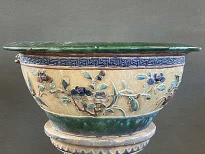 Large ceramic basin of round form, resting...