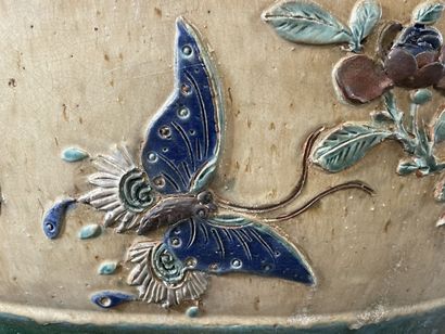 Large ceramic basin of round form, resting...