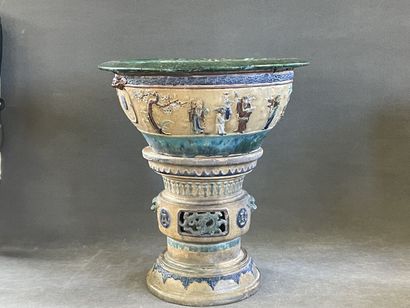 Large ceramic basin of round form, resting...