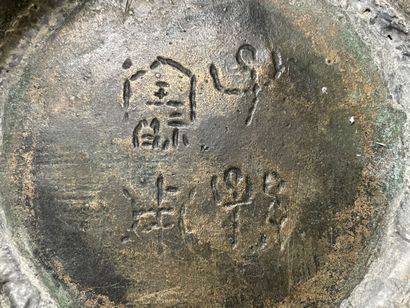 Bronze vase with stylized decoration. Mark...