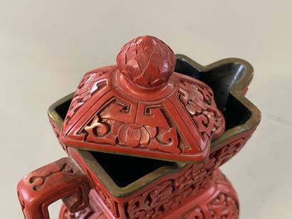 Carved lacquer jug on a wooden base. 
H....