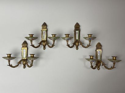 Suite de quatre appliques en bronze doré...