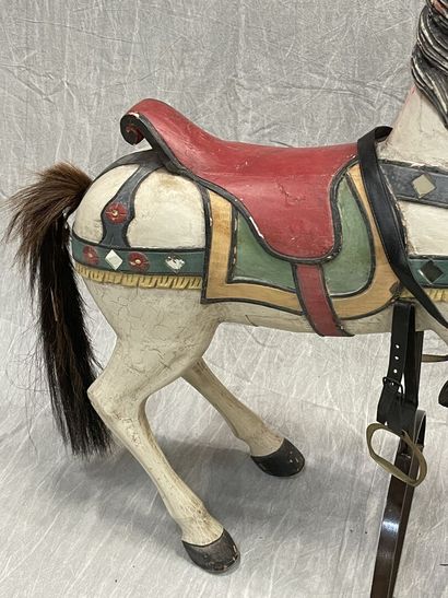 Cheval de manège en bois sculpté et laqué,...