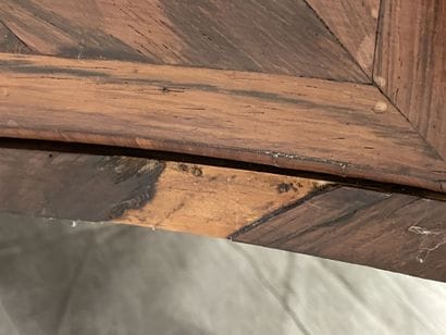 Chest of drawers in rosewood, opening with...