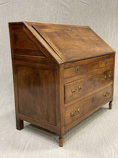 Scriban desk in walnut, opening to four drawers...