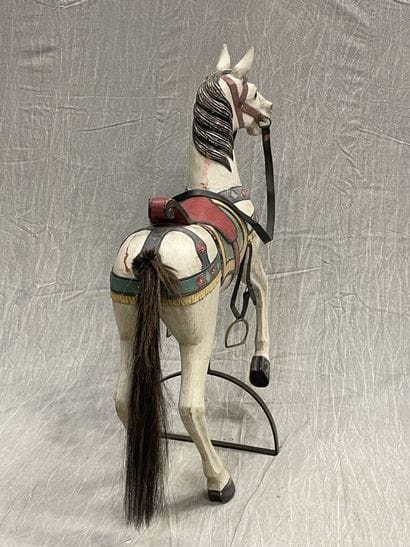 Cheval de manège en bois sculpté et laqué,...