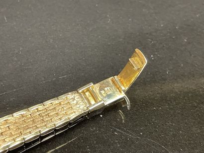 Montre en or et diamants.
Or 750°/00.
L:...