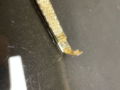 Montre en or et diamants.
Or 750°/00.
L:...