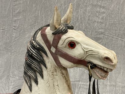 Cheval de manège en bois sculpté et laqué,...
