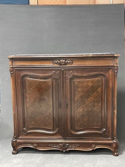Jeanselme house. 
Low sideboard in palisander...