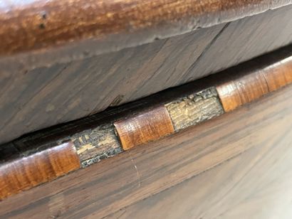 Chest of drawers in rosewood, opening with...
