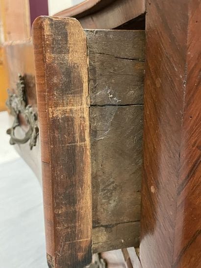 Chest of drawers in rosewood, opening with...