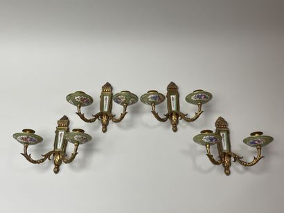 Suite de quatre appliques en bronze doré...