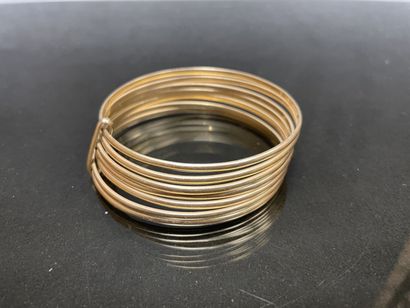 Bracelet semainier, assemblant sept joncs...