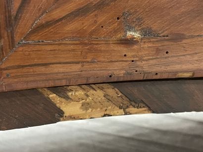 Chest of drawers in rosewood, opening with...