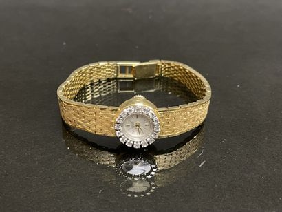 Montre en or et diamants.
Or 750°/00.
L:...