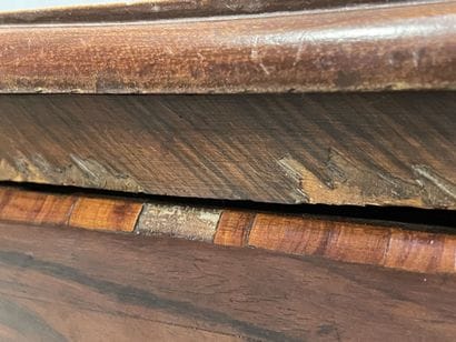 Chest of drawers in rosewood, opening with...