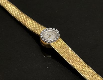 Montre en or et diamants.
Or 750°/00.
L:...