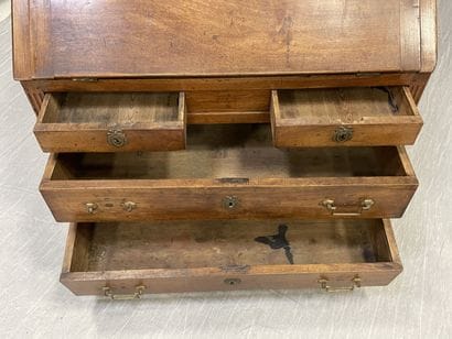 Scriban desk in walnut, opening to four drawers...