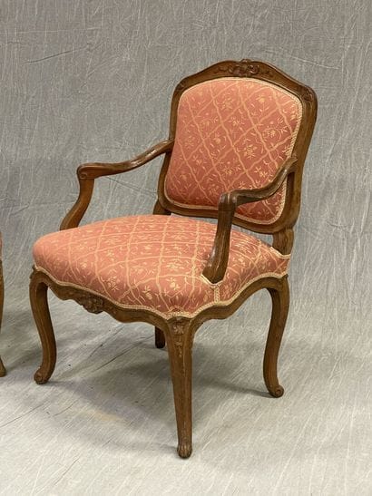 Two armchairs in carved walnut
Stamped Jean...