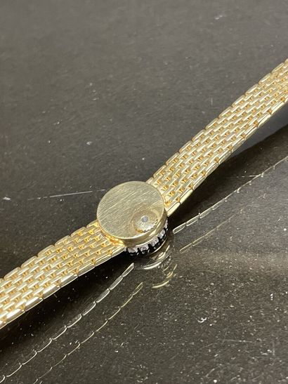 Montre en or et diamants.
Or 750°/00.
L:...