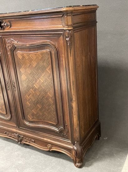 Jeanselme house. 
Low sideboard in palisander...