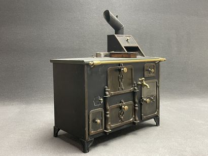 Cuisinière de poupée complète avec sa batterie...
