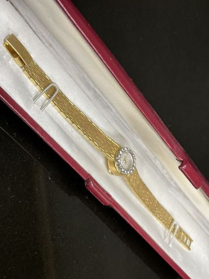 Montre en or et diamants.
Or 750°/00.
L:...