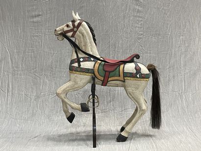 Cheval de manège en bois sculpté et laqué,...