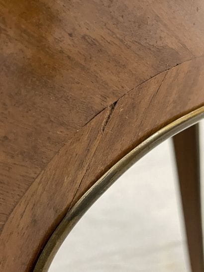 Pedestal table in frieze with four cambered...