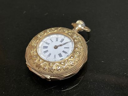 Neck watch in gold, enamelled with flowers...