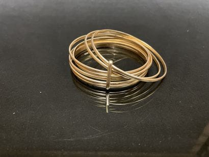 Bracelet semainier, assemblant sept joncs...