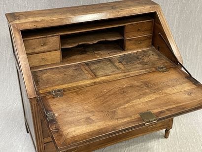 Scriban desk in walnut, opening to four drawers...