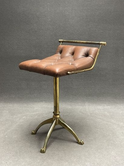 Swivel desk chair in tan leather and bronze...