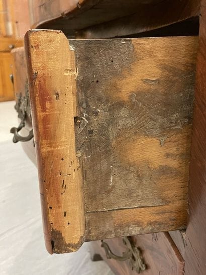 Chest of drawers in rosewood, opening with...