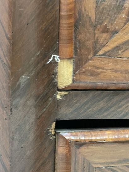 Chest of drawers in rosewood, opening with...