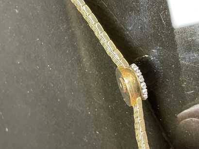 Montre en or et diamants.
Or 750°/00.
L:...