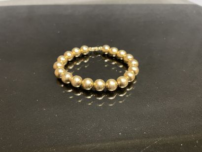 Bracelet en perles d'or, dit de Marseille.
Or...