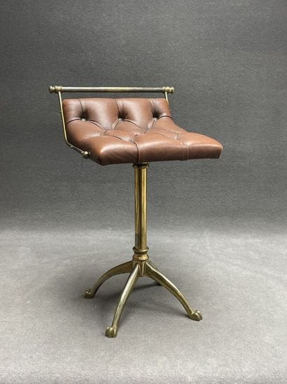Swivel desk chair in tan leather and bronze...