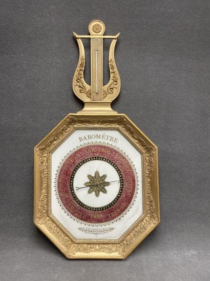 Barometer in carved wood and stucco, golden...