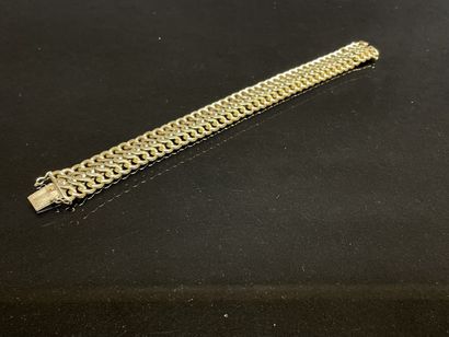 Bracelet manchette en or.
Or 750°/00.
L:...